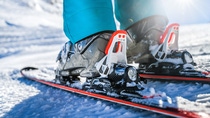 Winter skis and detailed view of the ski bindings concept in sunny day. Winter skis and detailed view of the ski bindings concept in sunny day.