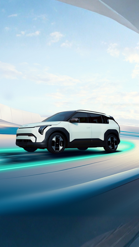 The KIA EV3 is driving on a fictional road. The KIA EV3 is driving on a fictional road.